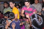Kapil and Mohit with Contestants of Indian Idol 4 participate in the Teach India initiative on 18th November 2008.JPG