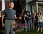 Clint Eastwood, Bee Vang, Ahney Her, Brooke Chia Thao, Chee Thao in still from the movie Gran Torino.jpg