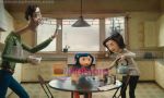 Teri Hatcher, Dakota Fanning, John Hodgman in still from the movie Coraline.jpg