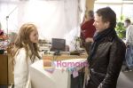 Jerry Bruckheimer, Isla Fisher in still from the movie Confessions of a Shopaholic.jpg