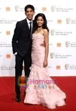 Dev-Patel-and-Freida-Pinto-poses-at-the-winner_s-board-at-The-Orange-British-Academy-Film-Awards-held-at-the-Royal-Opera-House-on-February-8,-2009-in-London,-England.jpg
