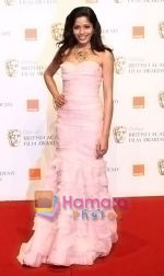 Freida-Pinto-poses-at-the-winner_s-board-at-The-Orange-British-Academy-Film-Awards-held-at-the-Royal-Opera-House-on-February-8,-2009-in-London,-England.jpg