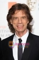 Mick-Jagger-poses-at-the-winner_s-board-at-The-Orange-British-Academy-Film-Awards-held-at-the-Royal-Opera-House-on-February-8,-2009-in-London,-England.jpg