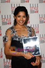 Frieda Pinto poses in the Press Roomwith her award for Best Actress at the ELLE Style Awards 2009 held at Big Sky London Studios on February 9, 2009 in London, England (2).jpg