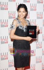 Frieda Pinto poses in the Press Roomwith her award for Best Actress at the ELLE Style Awards 2009 held at Big Sky London Studios on February 9, 2009 in London, England.jpg