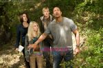 Carla Gugino, Dwayne Johnson, AnnaSophia Robb, Alexander Ludwig in still from the movie Race to Witch Mountain (3).jpg
