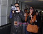 Aishwarya and Abhishek Bachchan arrive in Macau for IIFA on 10th June 2009 (5).JPG