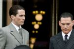 Christian Bale, Billy Crudup in still from the movie PUBLIC ENEMIES.jpg