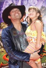 Robert Rodriguez and Rhiannon Rodriguez at the Premiere Of SHORTS held at The Grauman_s Chinese Theatre in Hollywood, California, USA on Aug 15th 2009 - IANS-WENN.jpg