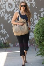 Elizabeth Berkley leaving her yoga class in Hollywood carrying a FEED bag in Los Angeles, California on 26th August 2009 - IANS-WENN (2).jpg