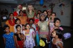 Claudia Ciesla celebrated X_mas with kids in Behrambaug, Jogeshwari on 21st Dec 2009 (22).JPG