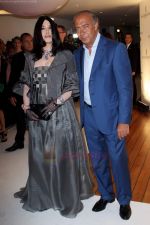 Isabelle Adjani and Fawaz Gruosi attend the de Grisogono party at the Hotel Du Cap on May 18, 2010 in Cap D_Antibes, France (2).JPG
