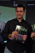Aamir Khan unveils Forbes India 1st anniversary special magazine in Landmark, Mumbai on 20th May 2010 (20).JPG