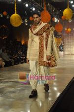 Model walks the ramp for Manish Malhotra Show on day 1 of HDIL on 6th Oct 2010 (24)~0.JPG