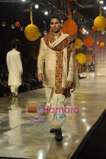 Model walks the ramp for Manish Malhotra Show on day 1 of HDIL on 6th Oct 2010 (25)~0.JPG