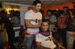 John Abraham,  Mahendra Singh Dhoni style each other at Mad-o-wat salon in Bandra, Mumbai on 4th Dec 2010 (9).JPG