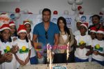 Ajay Devgan celeberates christmas with children in Mid Day Office on 22nd Dec 2010 (10).JPG