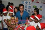 Ajay Devgan celeberates christmas with children in Mid Day Office on 22nd Dec 2010 (18).JPG
