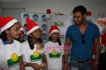 Ajay Devgan celeberates christmas with children in Mid Day Office on 22nd Dec 2010 (6).JPG