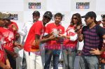 RJ Sidhu recieving the winner_s trophy from Jay Bhanushali and Amruta Patk at Fashion at Big Bazaar & Percept Media presents Cricket Day in SRPF Ground, Goregaon on 19th Feb 201i.JPG