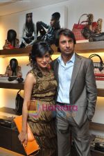 Chtrangada Singh & Jyoti Randhawa at Burberry store launch in Delhi on 28th Feb 2011.jpg