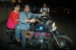 Arshad Warsi on his Harley bike with wife Maria as they went to watch The King_s Speech on 8th March 2011 (5).JPG