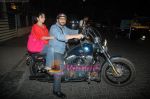 Arshad Warsi on his Harley bike with wife Maria as they went to watch The King_s Speech on 8th March 2011 (7).JPG