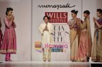 Model walks the ramp for Monapali show on Wills Lifestyle India Fashion Week 2011 - Day 1 in Delhi on 6th April 2011.JPG