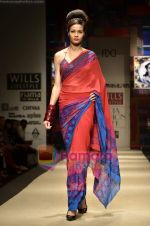 Model walks the ramp for Niki Mahajan show on Wills Lifestyle India Fashion Week 2011-Day 4 in Delhi on 9th April 2011 (104).JPG