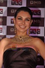 Lisa Ray launches TLC Oh My Gold in ITC on 1st July 2011 (33).JPG