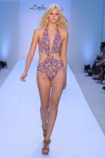 A model walks the runway at the Dolores Cortes swim show during Mercedes-Benz Fashion Week Swim 2012 at The Raleigh on July 16, 2011 in Miami Beach, Florida (3).JPG