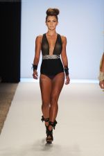A model walks the runway at the White Sands Australia show during Merecdes-Benz Fashion Week Swim 2012 at The Raleigh on July 15, 2011 in Miami Beach, Florida. (2).JPG