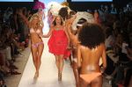 A model walks the runway during LSPACE BY MONICA WISE show at Mercedes-Benz Fashion Week Swim shows at The Raleigh on July 15, 2011 in Miami Beach, Florida.JPG