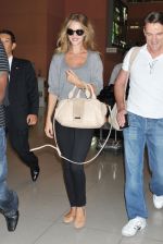 Rosie Huntington-Whiteley snapped on arrival at Kansai International Airport, Japan on 15th July 2011 (4).jpg