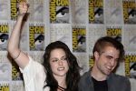Kristen Stewart, Robert Pattinson poses to promote Breaking Dawn from the Twilight Saga at  the 2011 Comic-Con International Day 1 at the San Diego Convention Center on July 21, 2011 (4).jpg