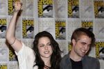 Robert Pattinson, Kristen Stewart poses to promote Breaking Dawn from the Twilight Saga at  the 2011 Comic-Con International Day 1 at the San Diego Convention Center on July 21, 2011 (3).jpg