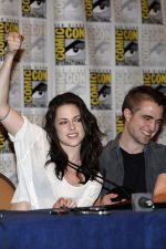Robert Pattinson, Kristen Stewart poses to promote Breaking Dawn from the Twilight Saga at  the 2011 Comic-Con International Day 1 at the San Diego Convention Center on July 21, 2011 (8).jpg