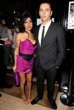 Amy Winehouse with Reg Traviss.jpg