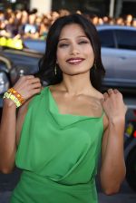 Freida Pinto attends the LA Premiere of the movie Rise Of The Planet Of The Apes on 28th July 2011 at the Grauman_s Chinese Theatre in Hollywood, CA  United States (19).jpg
