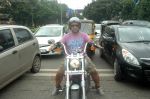 Vishal Dadlani snapped on his bike on a busy road in Mumbai on 22nd Aug 2011 (10).JPG
