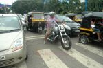 Vishal Dadlani snapped on his bike on a busy road in Mumbai on 22nd Aug 2011 (13).JPG
