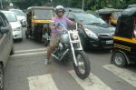 Vishal Dadlani snapped on his bike on a busy road in Mumbai on 22nd Aug 2011 (14).JPG