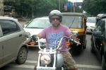 Vishal Dadlani snapped on his bike on a busy road in Mumbai on 22nd Aug 2011 (5).JPG