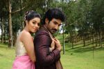 Shamna Kasim (Poorna), Sai Pradeep Pinisetty (Aadhi) in Chelagatam Movie Stills (8).jpg