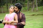 Shamna Kasim (Poorna), Sai Pradeep Pinisetty (Aadhi) in Chelagatam Movie Stills (17).jpg