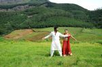 Shamna Kasim (Poorna), Sai Pradeep Pinisetty (Aadhi) in Chelagatam Movie Stills (42).jpg