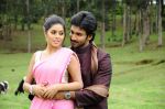 Shamna Kasim (Poorna), Sai Pradeep Pinisetty (Aadhi) in Chelagatam Movie Stills (47).jpg