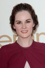 Michelle Dockery attends the 63rd Annual Primetime Emmy Awards in Nokia Theatre L.A. Live on 18th September 2011 (1).jpg