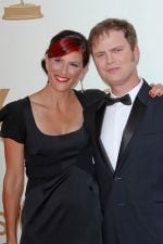 Rainn Wilson and Holiday Reinhorn attends the 63rd Annual Primetime Emmy Awards in Nokia Theatre L.A. Live on 18th September 2011 Rainn Wilson and Holiday Reinhorn attends the 63rd Annual Primetime Emmy Awards in Nokia Theatre L.A. Live on 18th September 2011.jpg
