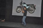 John abraham lifts a bike at Force Promotions in Mehboob, Mumbai on 27th Sep 2011 (14).JPG